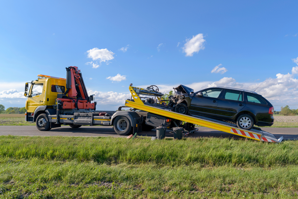 After,An,Accident,The,Crashed,Car,Is,Pulled,Onto,A