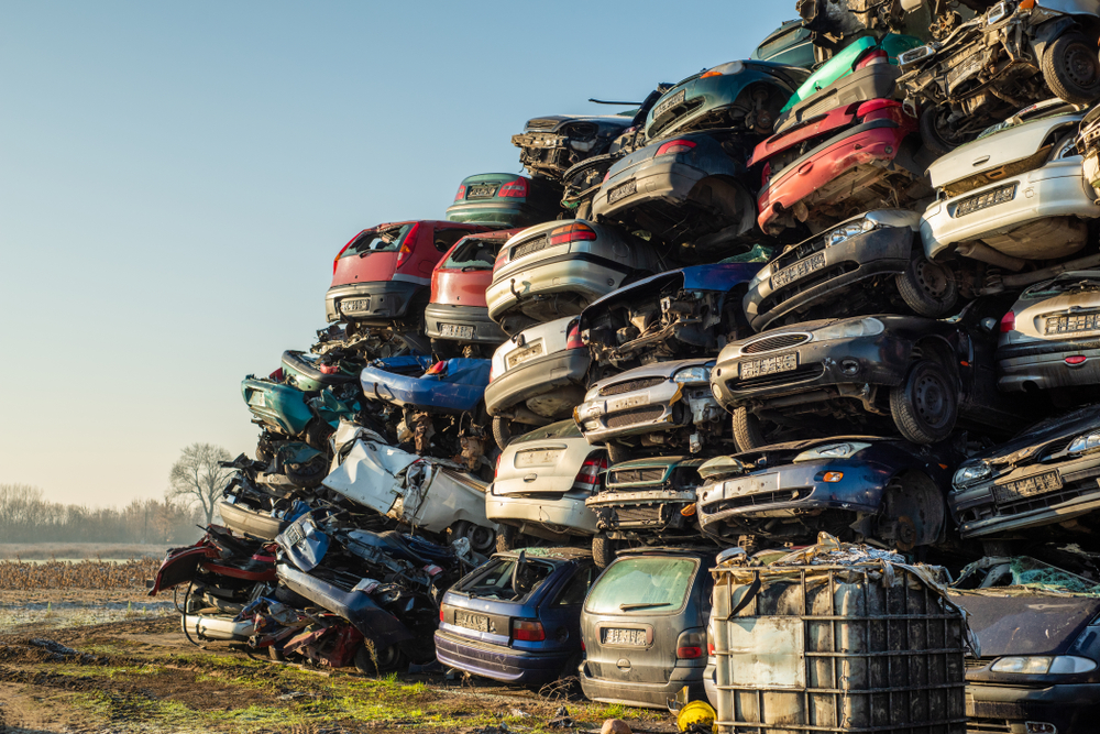 Pile,Of,Crashed,Compressed,Cars,On,The,Scrapyard,With,Negative